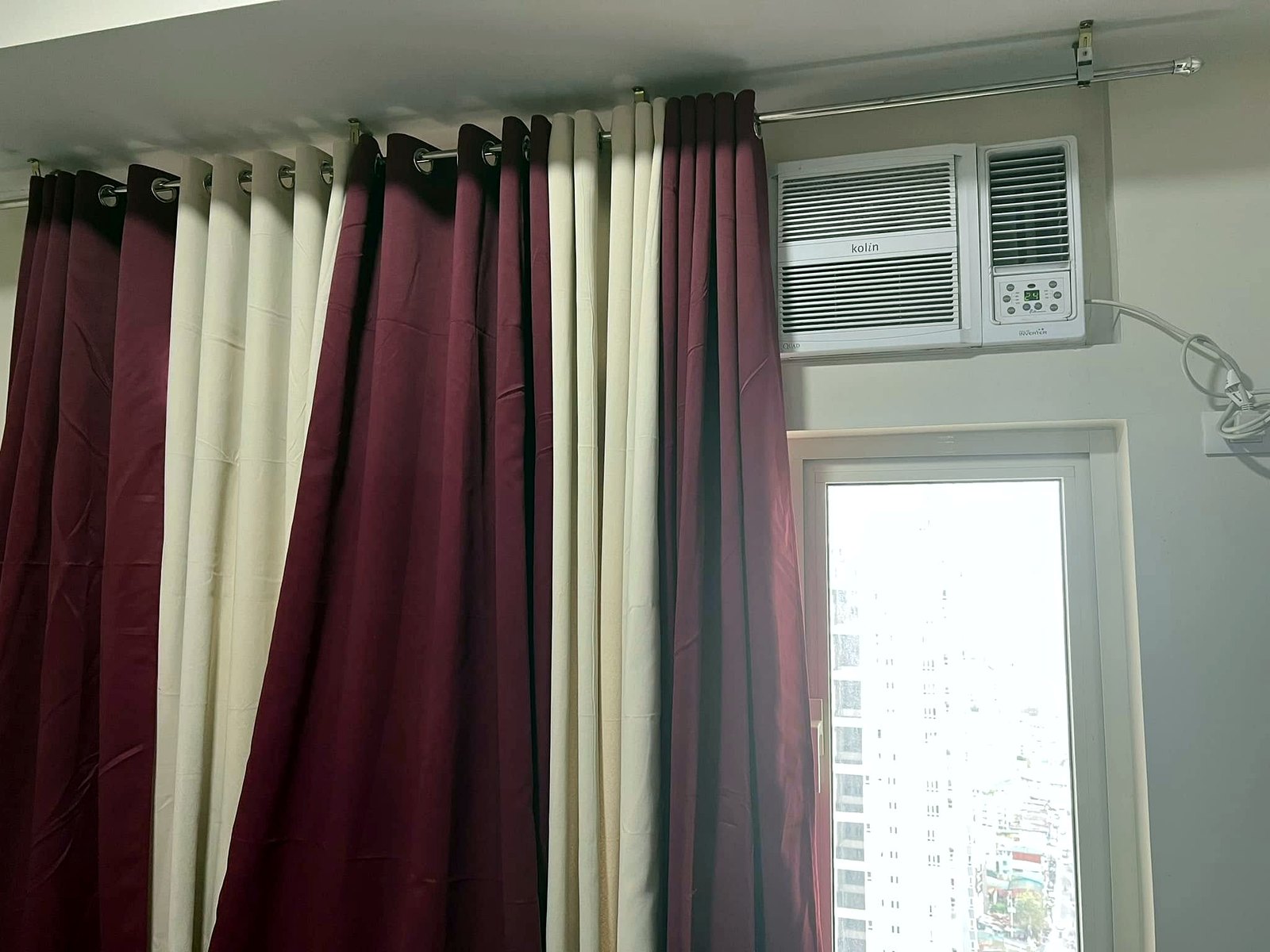 Air conditioner and curtains