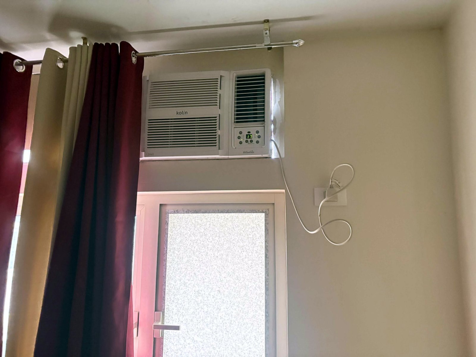 Air conditioner and window